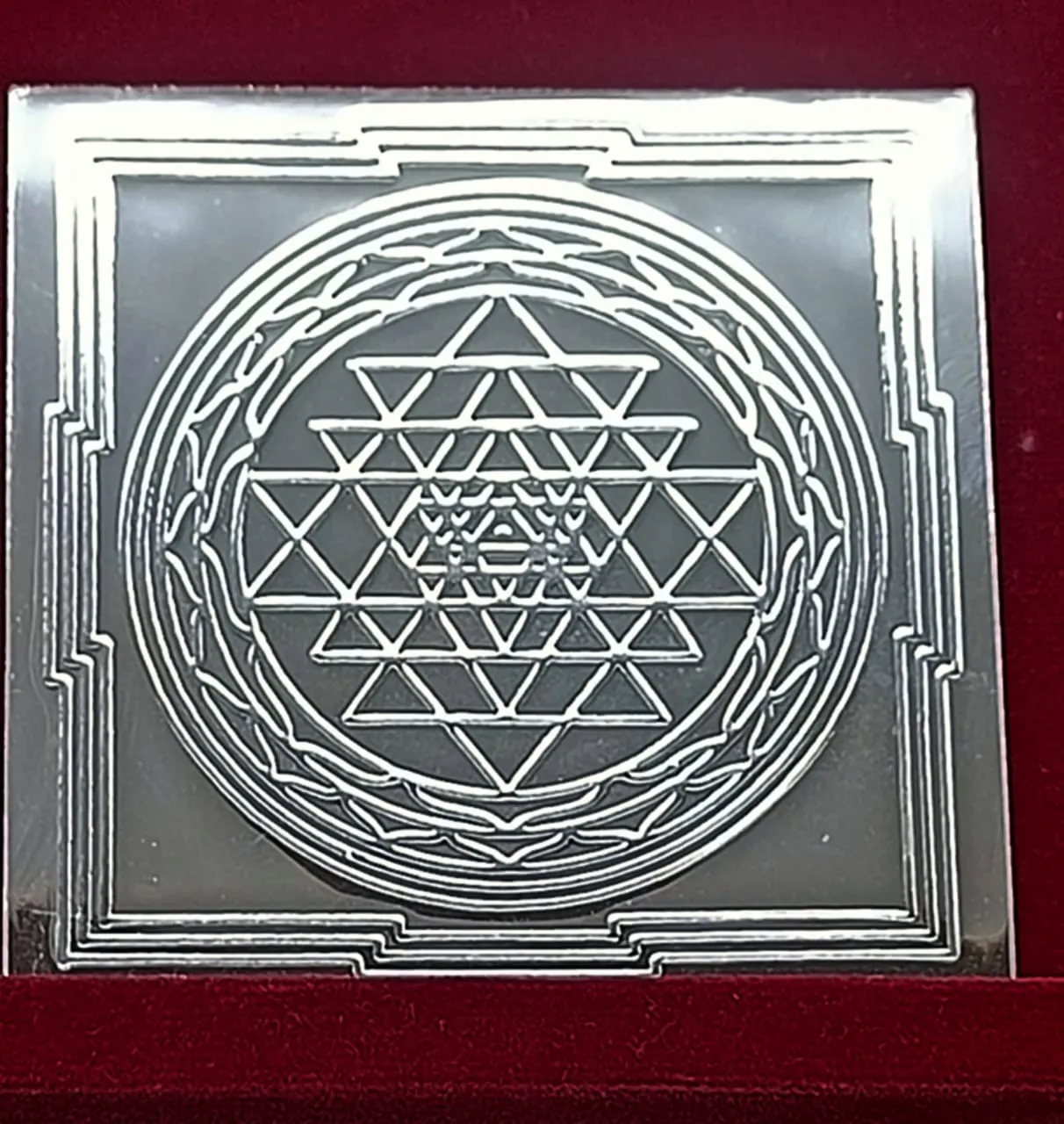 Engraved yantra plate prepared and energised for a prescribed remedy